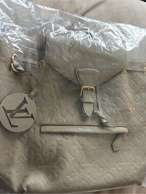 Louis Vuitton Taupe Embossed Monogram Backpack with Gold-Tone Accents